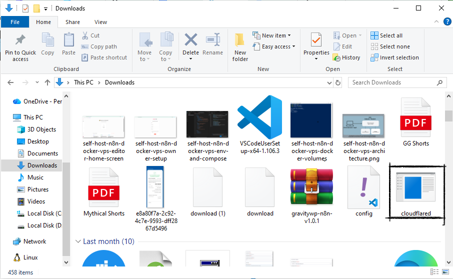 Windows Downloads folder showing cloudflared.exe for Cloudflare Tunnel